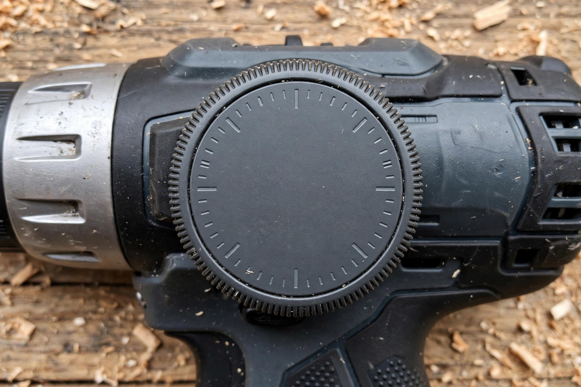 Close-up of a clutch and torque dial on a cordless drill for woodworking beginners showing numbered settings